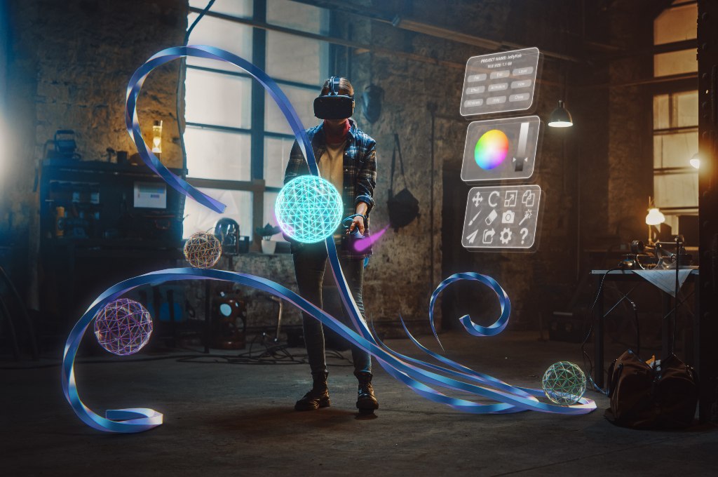 stock-photo-talented-female-artist-wearing-augmented-reality-headset-working-on-abstract-d-sculpture-with-1817816837